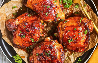 Baked Chicken Thighs with Spicy Honey and Peanut Sauce