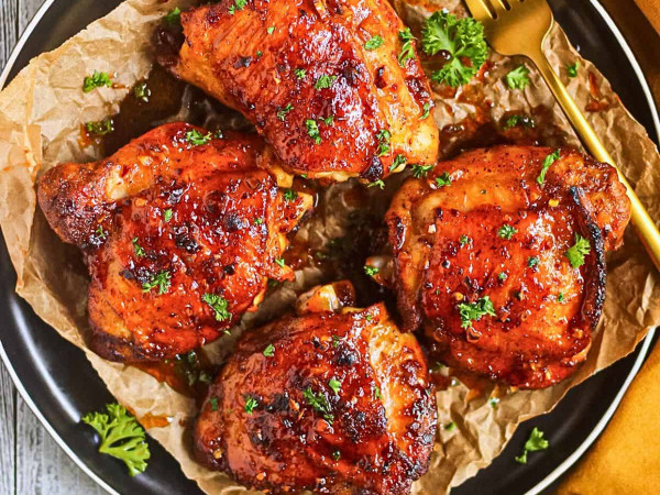 Baked Chicken Thighs with Spicy Honey and Peanut Sauce