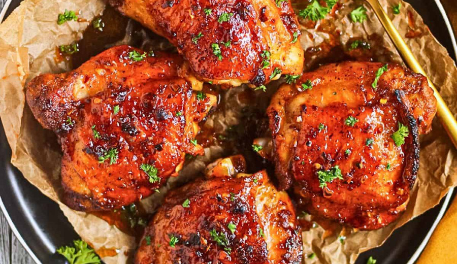Baked Chicken Thighs with Spicy Honey and Peanut Sauce