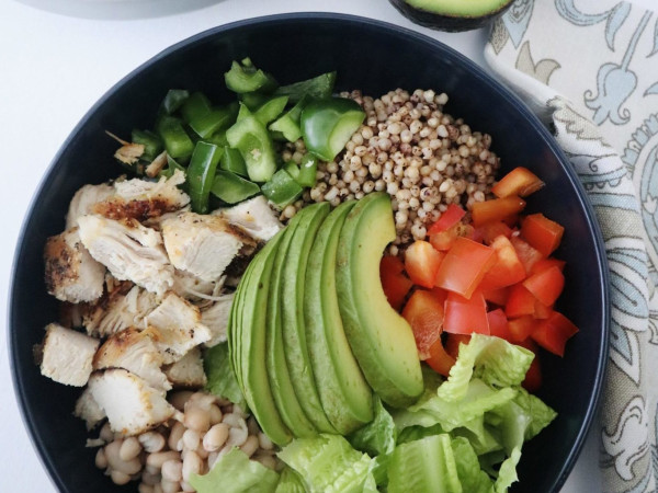 Sorghum Bowl with Quail Egg, Avocado, Kumato®, and Buffalo Mozzarella