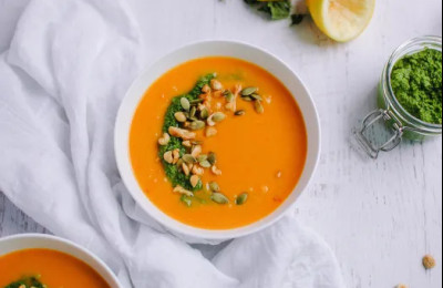 Vegan Sweet Potato Soup Topped with Kale Pesto
