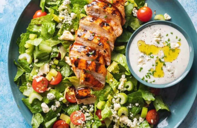 Buffalo Chicken Salad Topped with Bacon and Blue Cheese