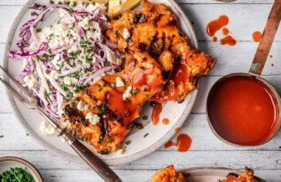 Buffalo Chicken Thighs on the Grill with Blue Cheese Slaw