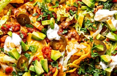 Sheet Pan Nachos with Sticky Sesame Ginger Wings and Loaded Smashed Potatoes using Reynolds Wrap®
